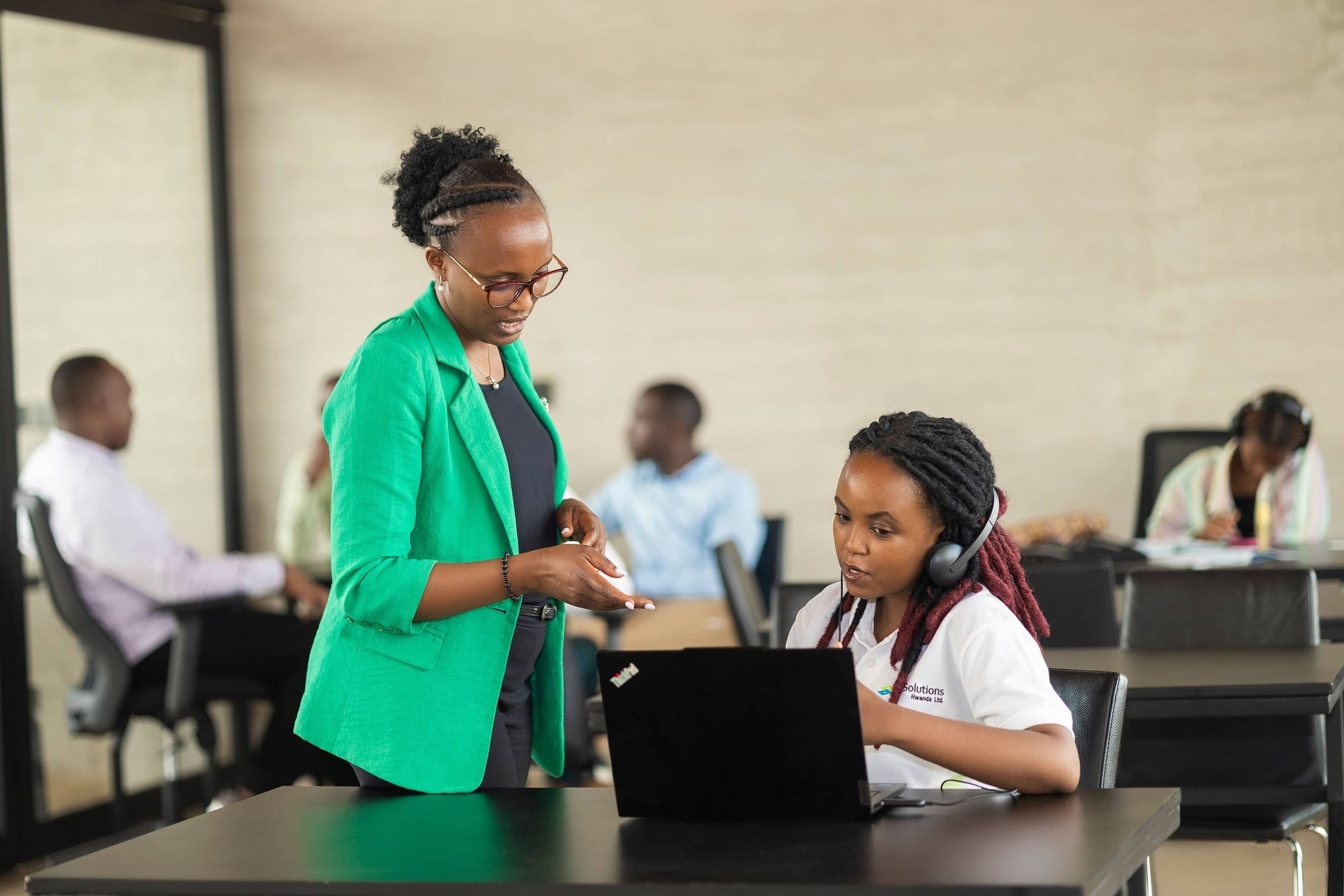 TestSolutions employees discuss